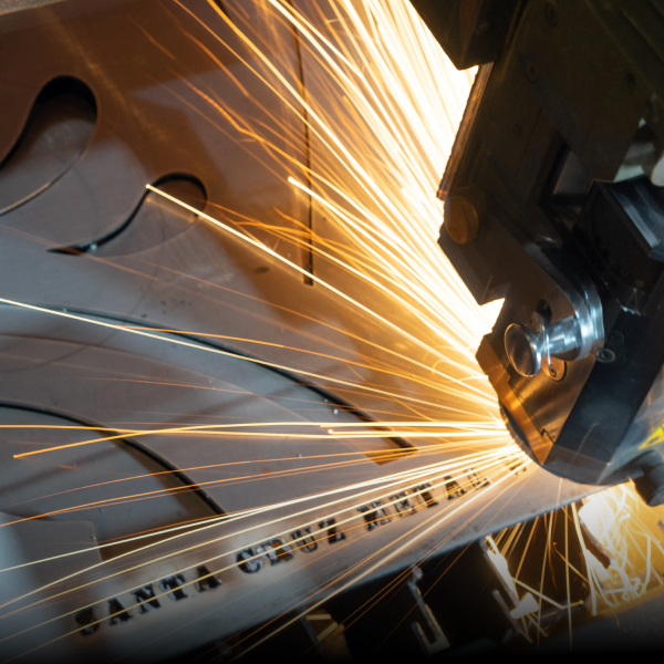 An industrial cutting machine in action